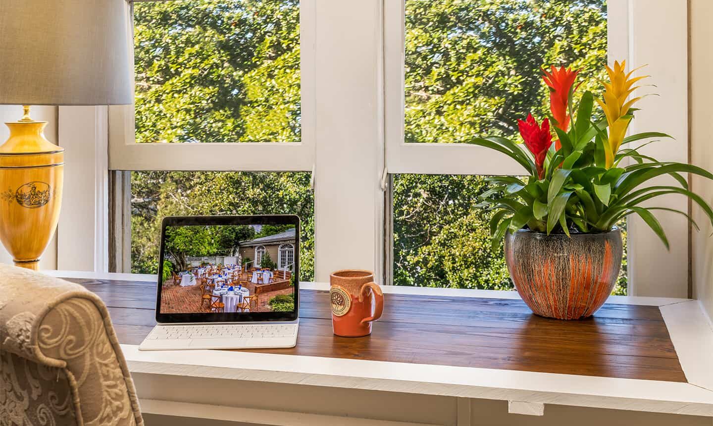 Desk with laptop looking out to garden