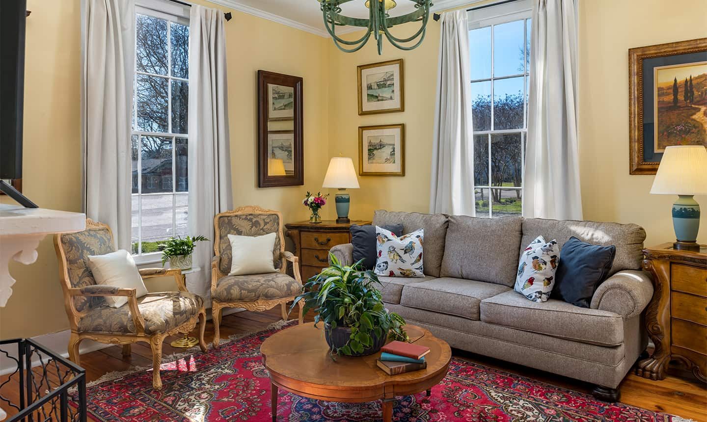 Living Room with couch and chair in Martha Edwards Suite
