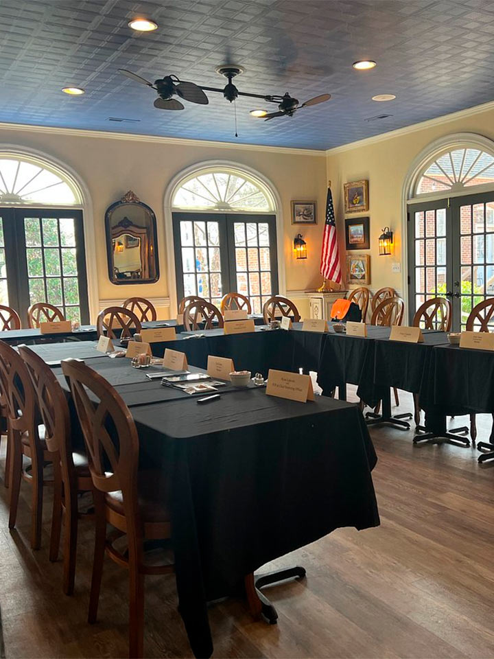 Corporate retreat in Edenton, NC. Tables set up for an executive board meeting.
