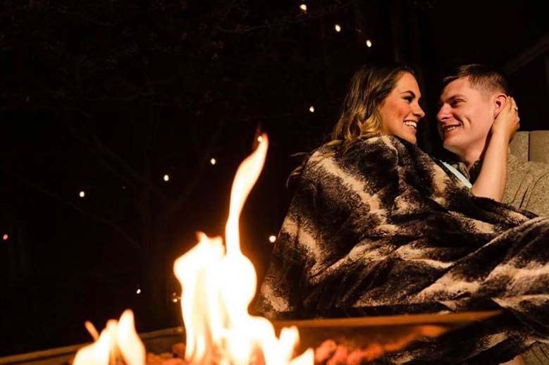 sitting by the fire on date night at the Inner banks Inn