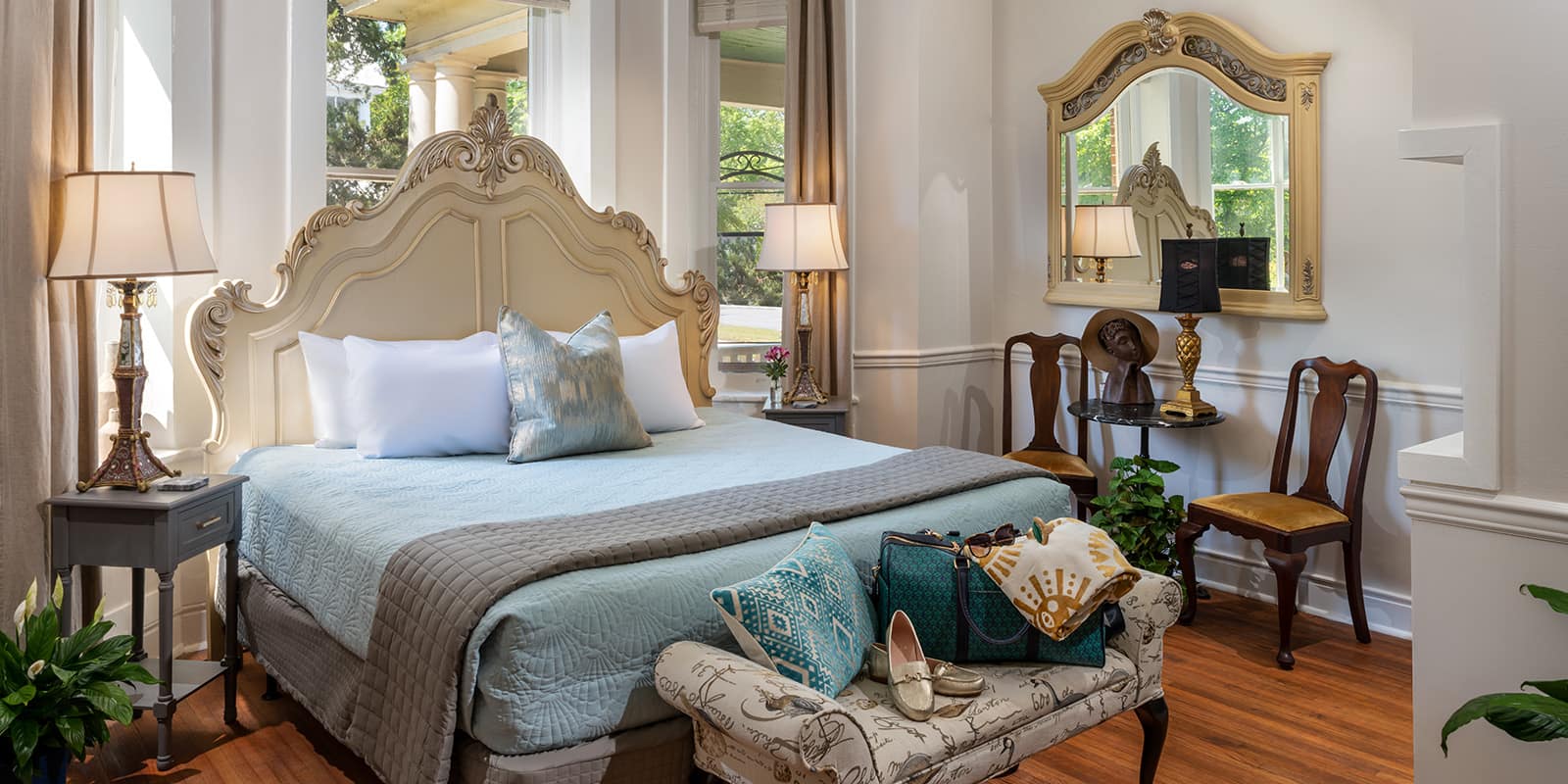 King bed and bench in Penelope Barker Suite