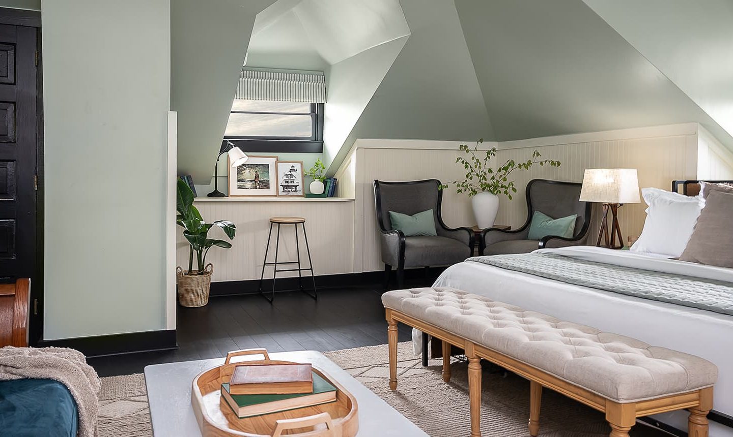 Bed, Chairs, bench, and more in The Loft Suite