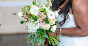 Holding Wedding Flowers at Edenton Wedding