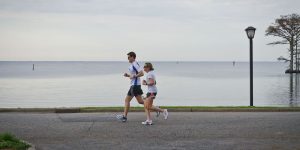 A couple jogging along the Edenton Harbor