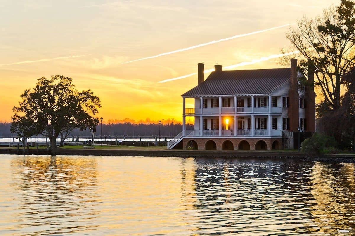 The sun setting behind the Penelope Barker House in Edenton, NC
