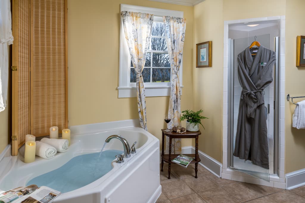 A robe hanging on the shower in the spa bathroom at our North Carolina bed and breakfast.