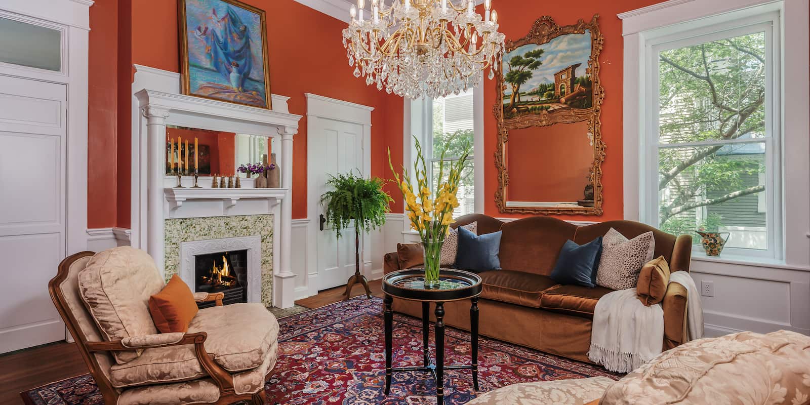 A seating area decorated with antique furniture in the Tillie Bond cottage at our North Carolina bed and breakfast