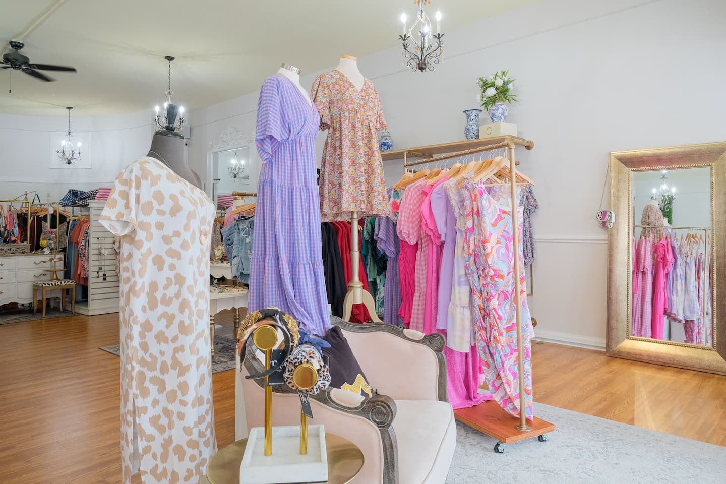 A shop in Edenton with bright floral dresses