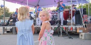 Children enjoying live music during Sounds of Summer, one of the family-friendly NC concerts held in downtown Edenton